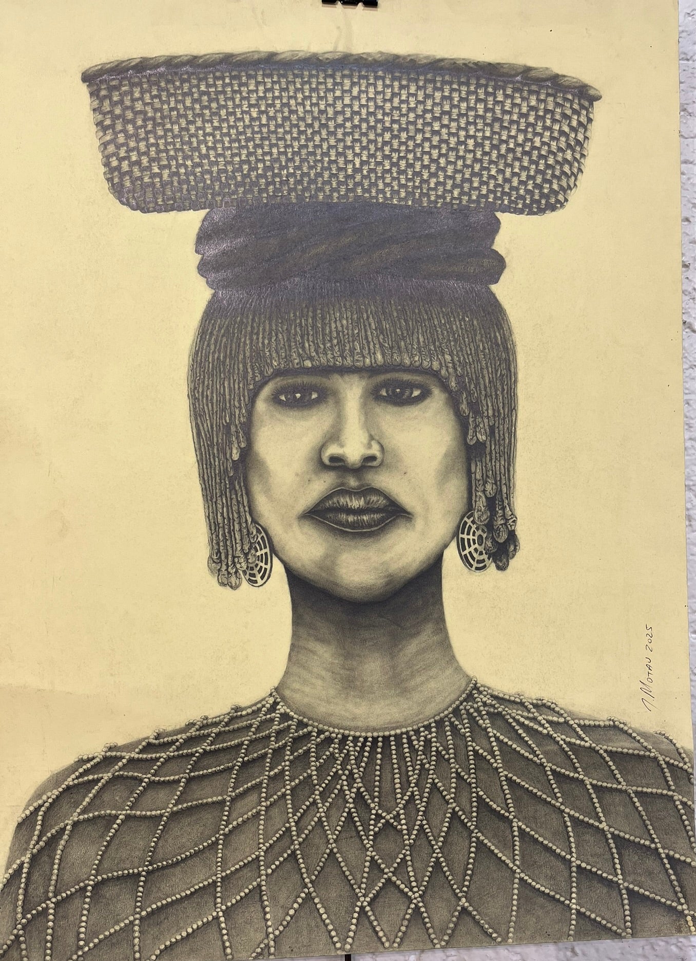 Artistic depiction of a person with a woven basket on their head against a beige background